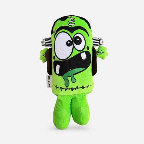 Juguete de peluche para perros marca Verný con forma de monstruo Frankenstein verde. Tiene grandes ojos saltones, una boca sonriente con un colmillo y baba, detalles de costuras y tornillos grises en los laterales.