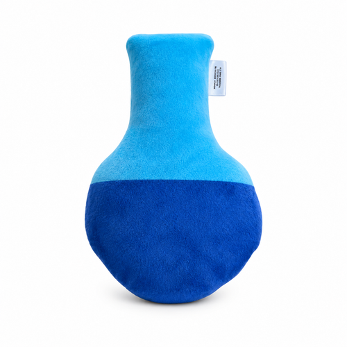 Vista trasera del juguete de peluche Verný en forma de matraz, mostrando la mitad superior en color celeste y la mitad inferior en azul oscuro liso, con la etiqueta de la marca en el lateral.